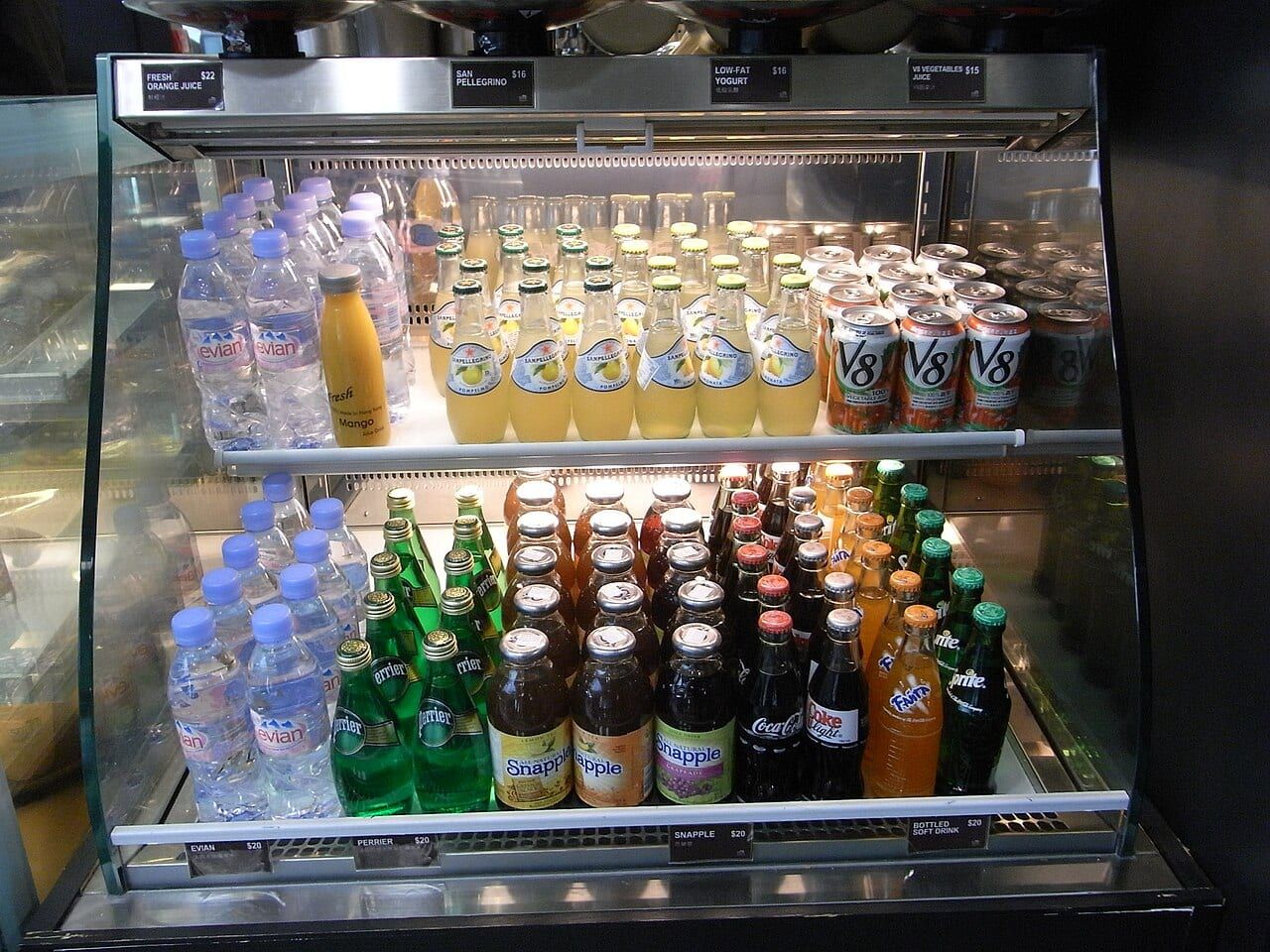 Snapple bottles on a shop shelf.